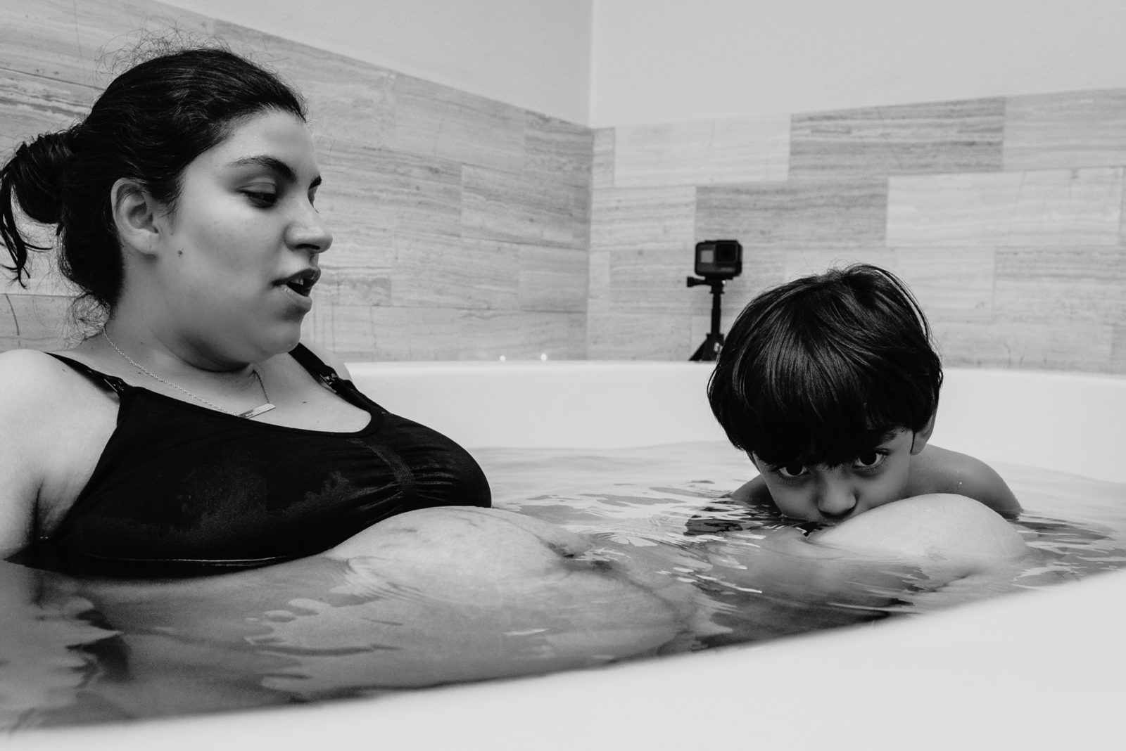 blowing bubbles in the birth tub