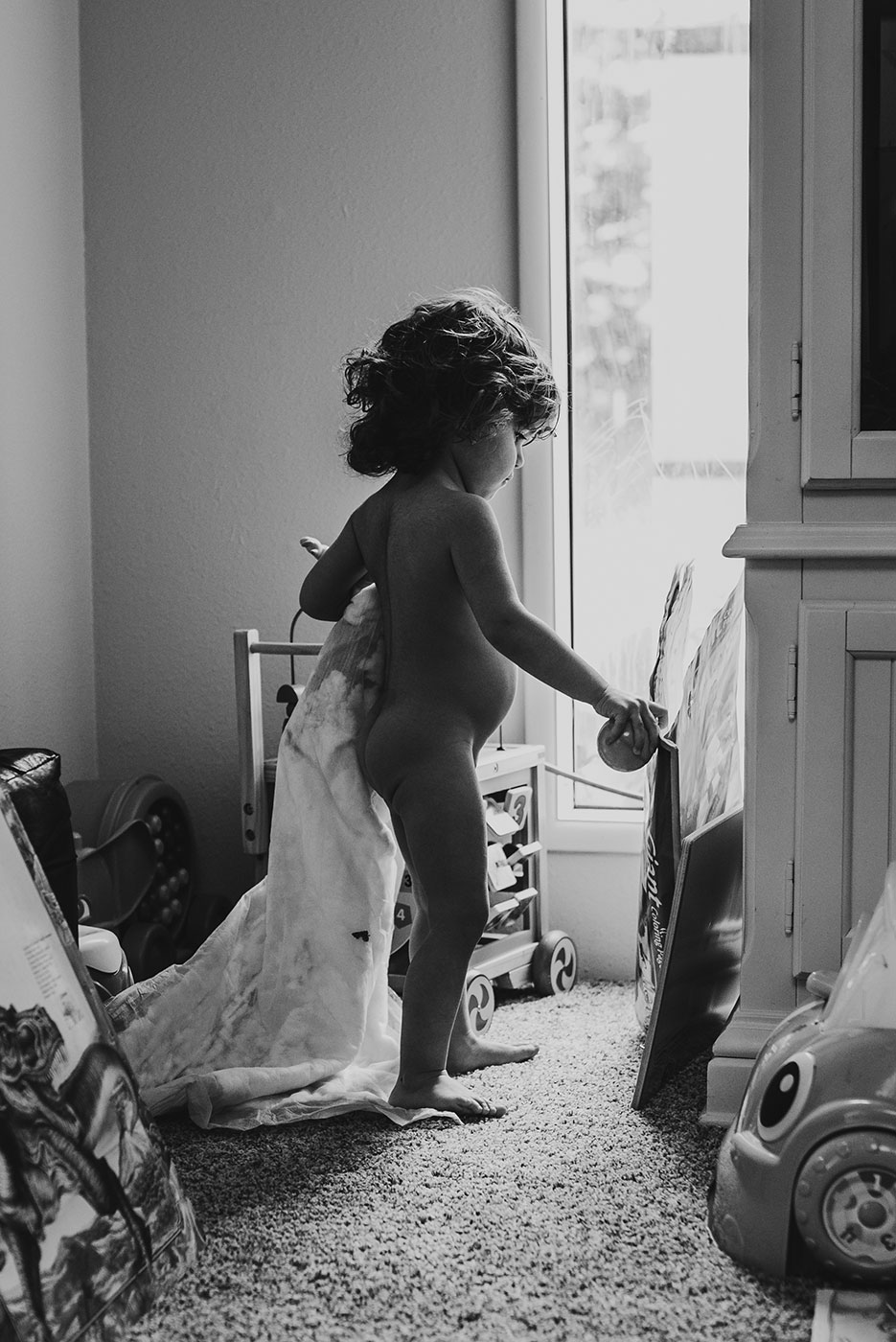 two year old in her birthday suit